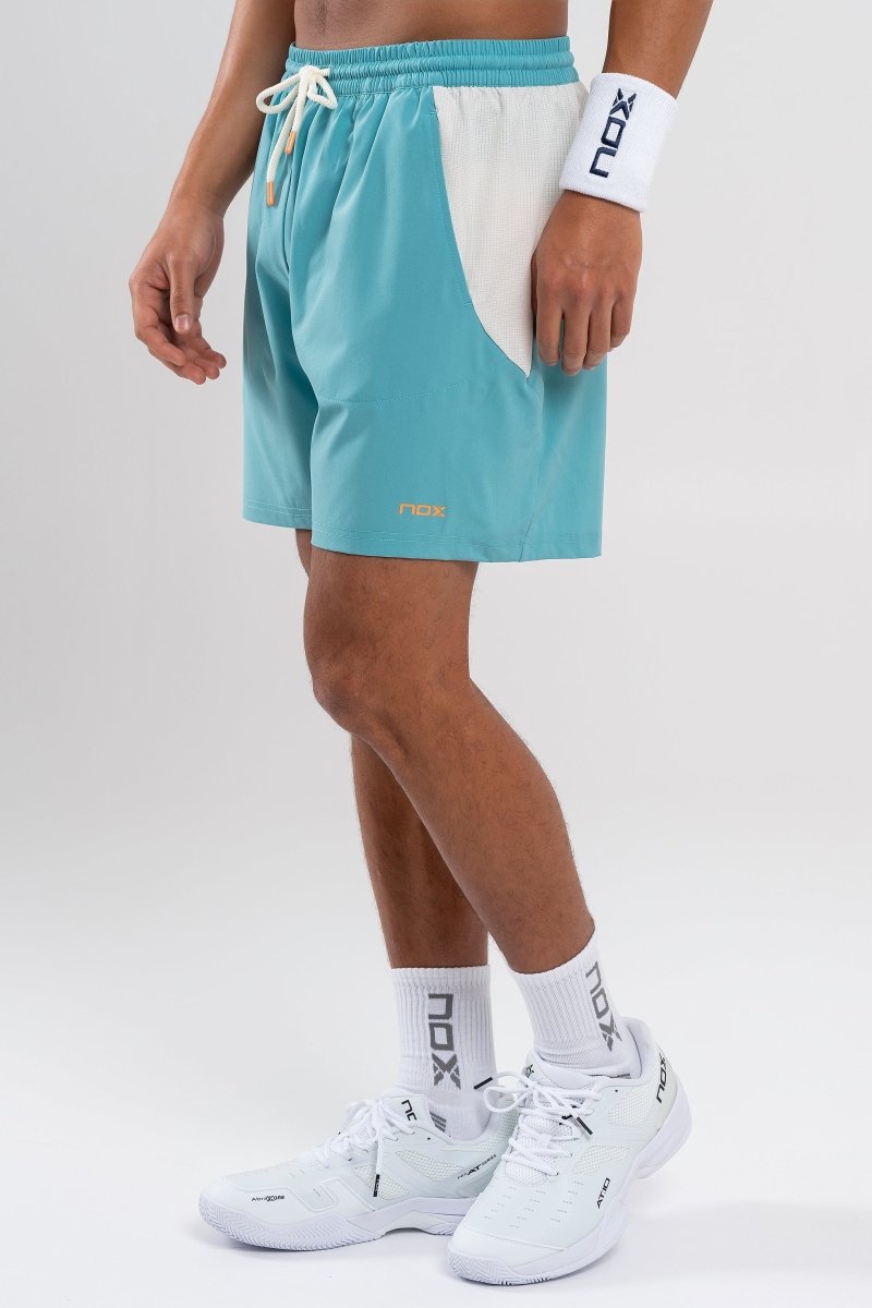 Pantalón corto deportivo hombre PRO turquesa