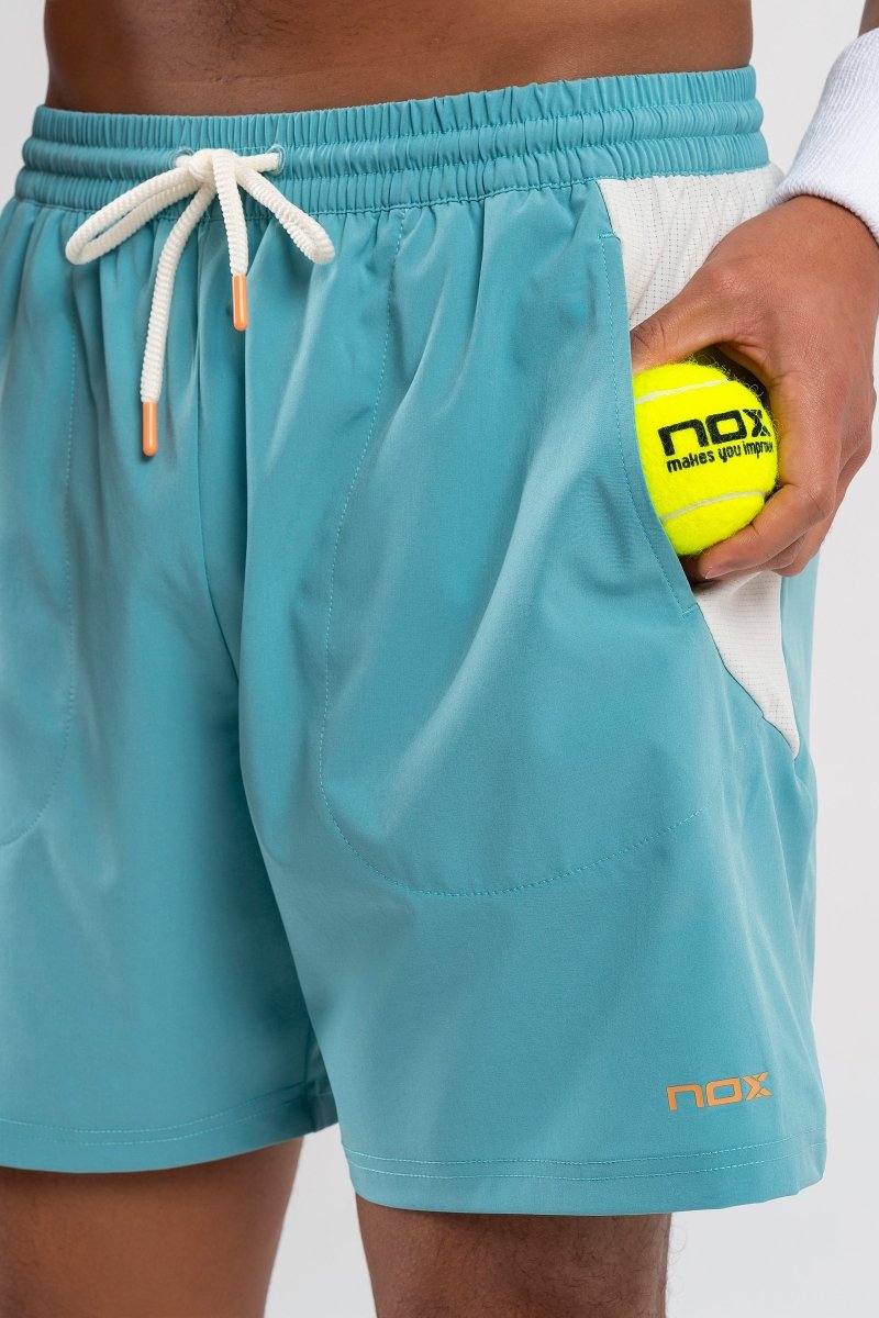 Pantalón corto deportivo hombre PRO turquesa